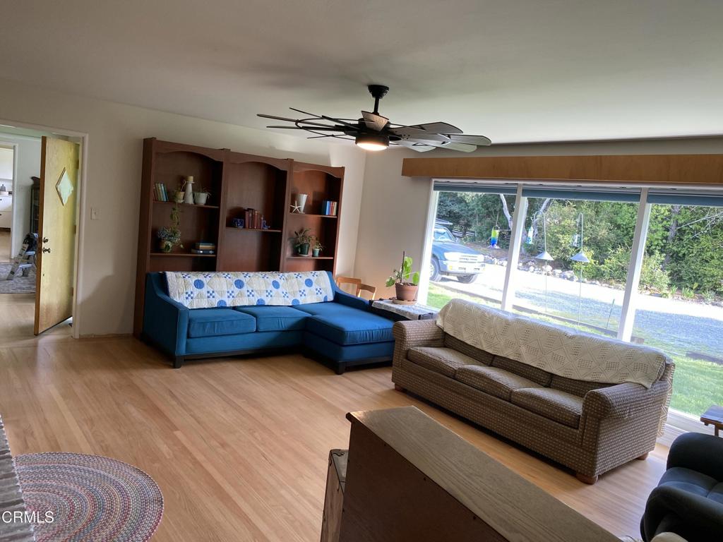 31400 Sherwood Road Fort Bragg, CA 95437 - Photo 28 of 55 a living room with furniture and a large window
