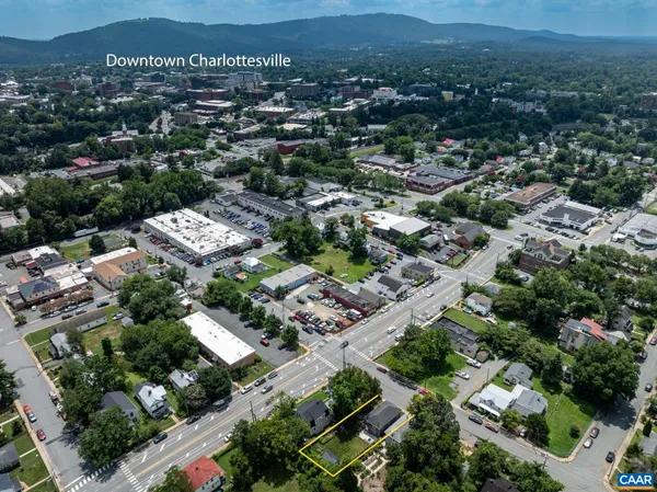 an aerial view of a city with lots of residential buildings
