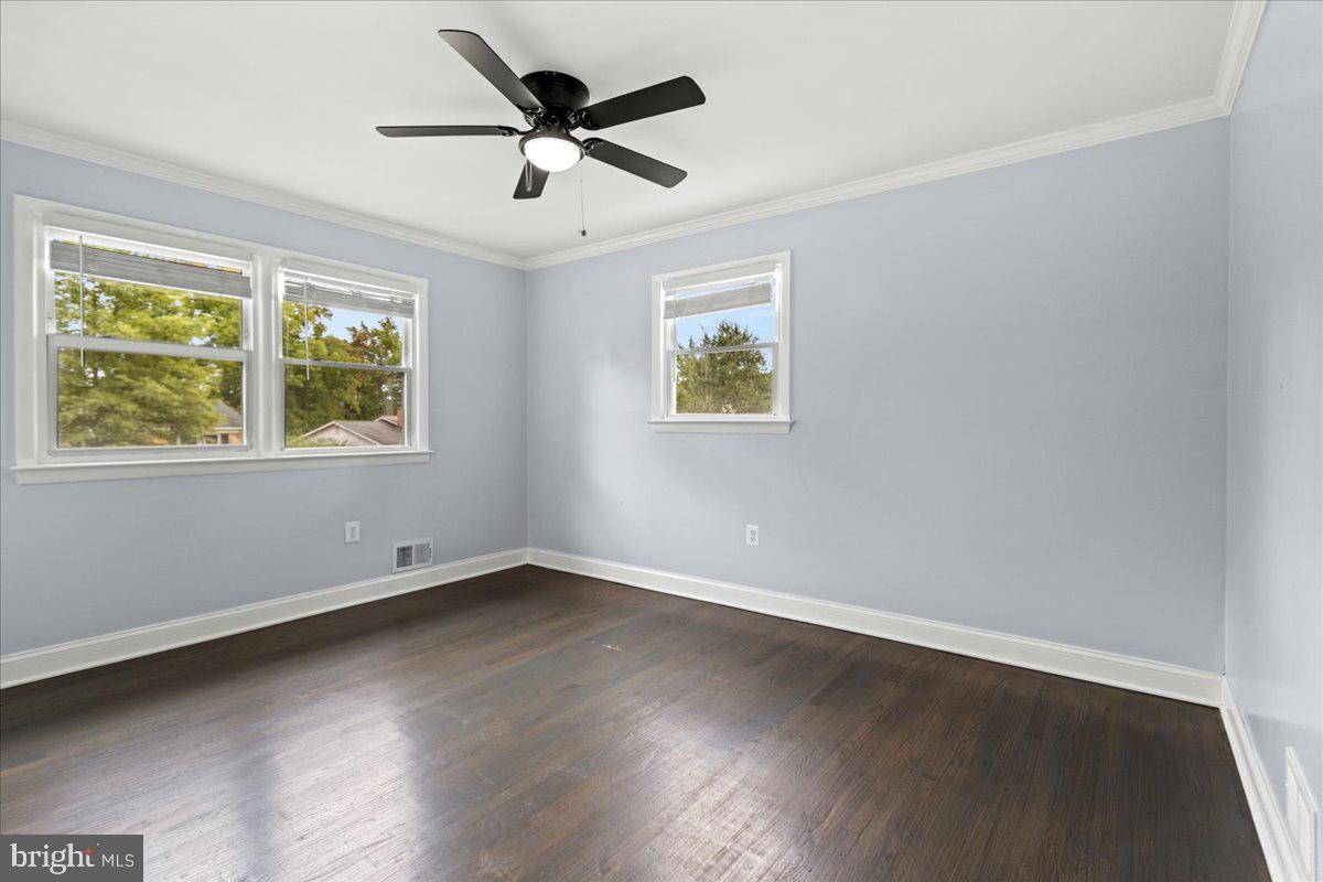 517 Round Table Drive Fort Washington, MD 20744 - Photo 12 of 25 a view of an empty room with wooden floor and a window