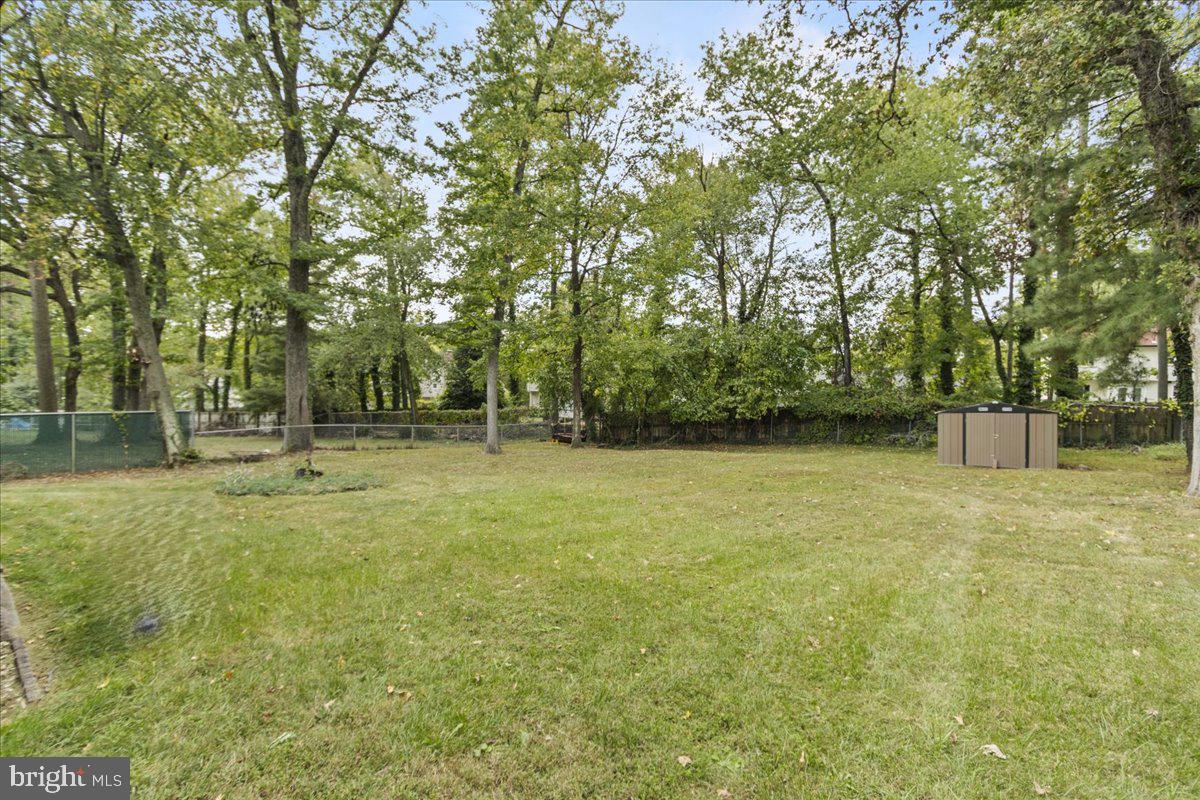 517 Round Table Drive Fort Washington, MD 20744 - Photo 25 of 25 a view of outdoor space with deck and trees