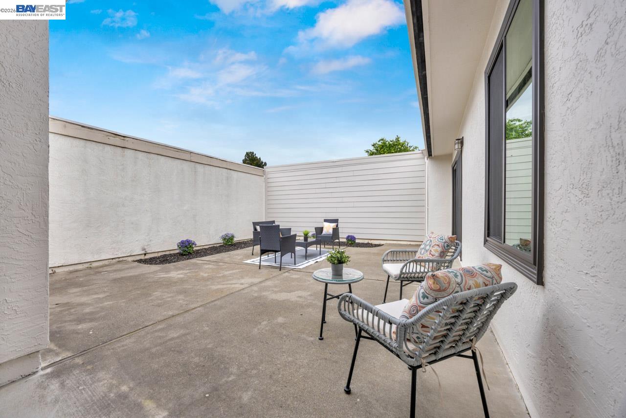 4034 Rennellwood Way Pleasanton, CA 94566 - Photo 12 of 42 a view of a patio with couple of chairs and couch