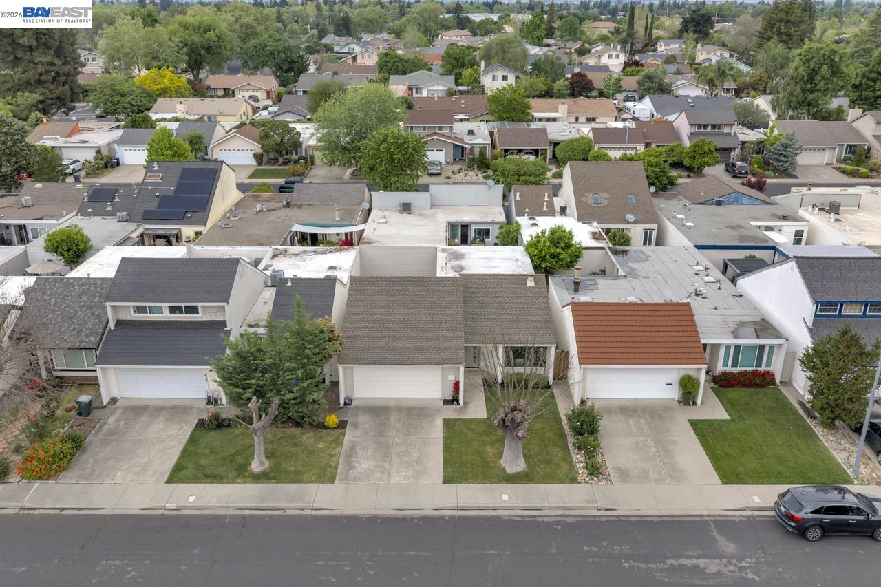 4034 Rennellwood Way Pleasanton, CA 94566 - Photo 2 of 42 an aerial view of a house with garden space and street view