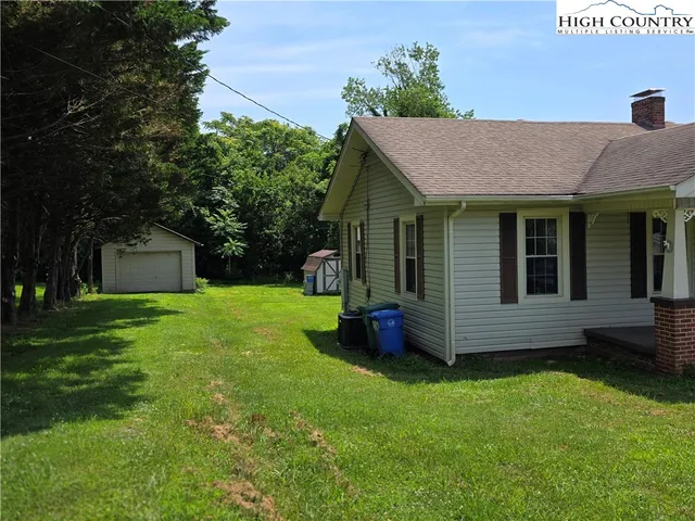 a view of a house with a garden