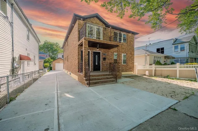 a view of a house with a street