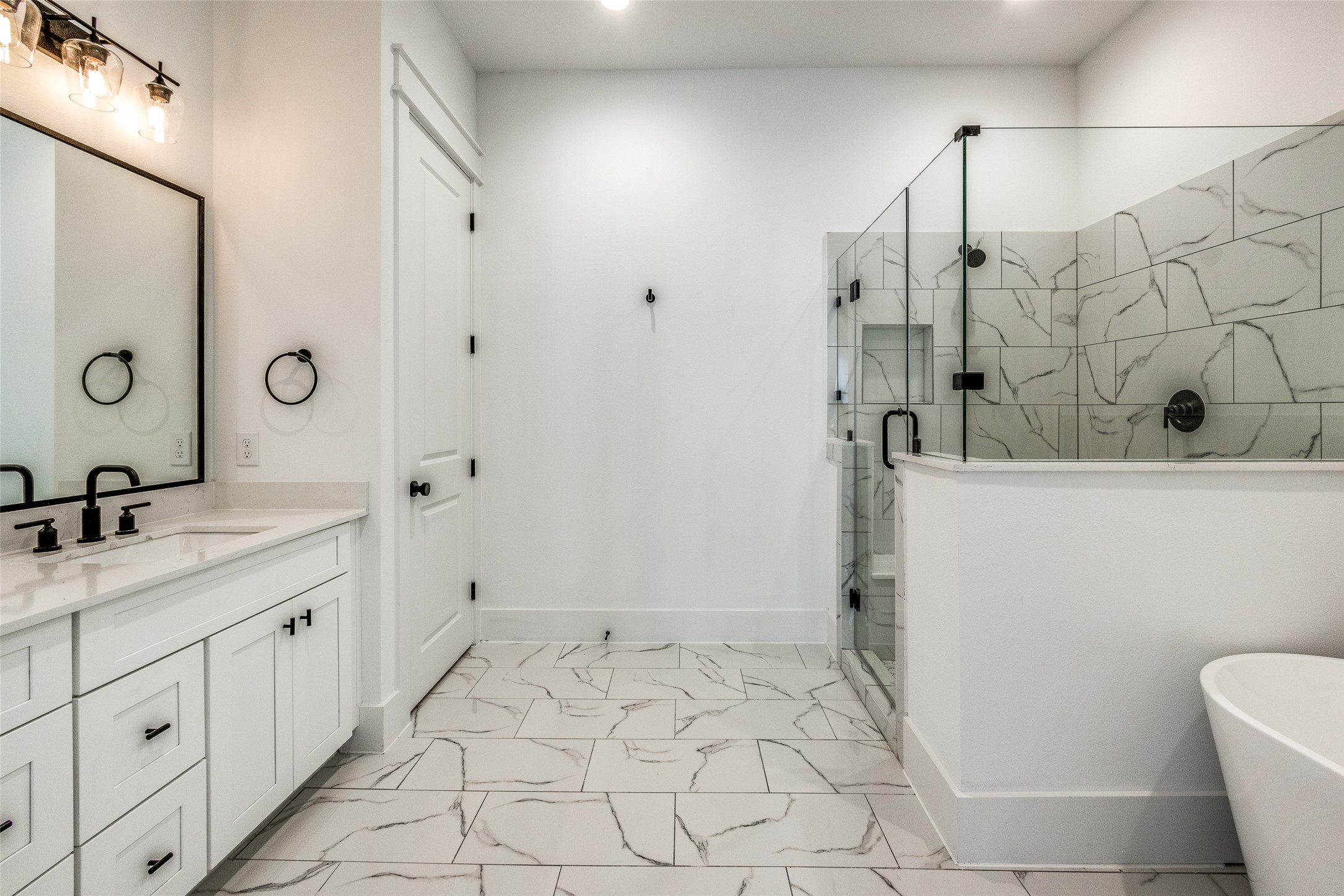 948 Fisher Street, Unit B Houston, TX 77018 - Photo 15 of 25 a bathroom with a granite countertop sink a toilet and a shower