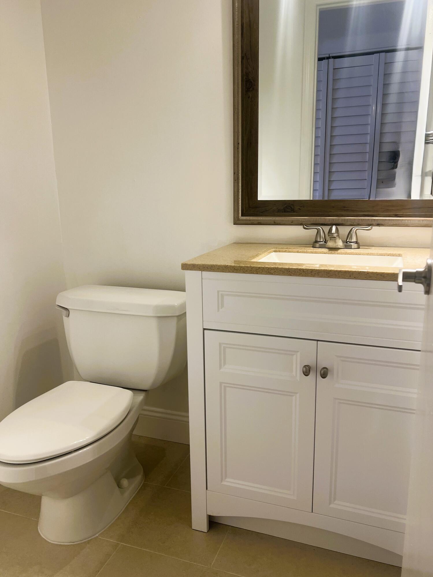 6030 Indrio Road, Unit 5 Fort Pierce, FL 34951 - Photo 9 of 20 IMG_4075