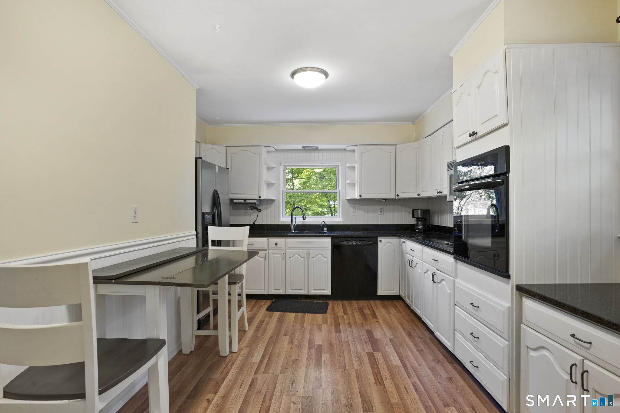 2 Laurel Hill Road South Sherman, CT 06784 - Photo 11 of 35 a kitchen with granite countertop white cabinets and white appliances