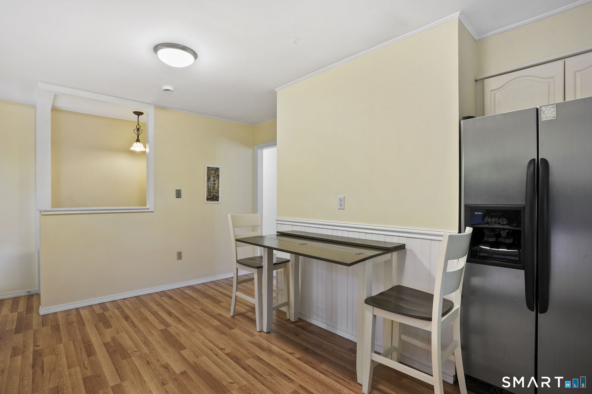 2 Laurel Hill Road South Sherman, CT 06784 - Photo 14 of 35 a empty room with wooden floor and electronic appliances