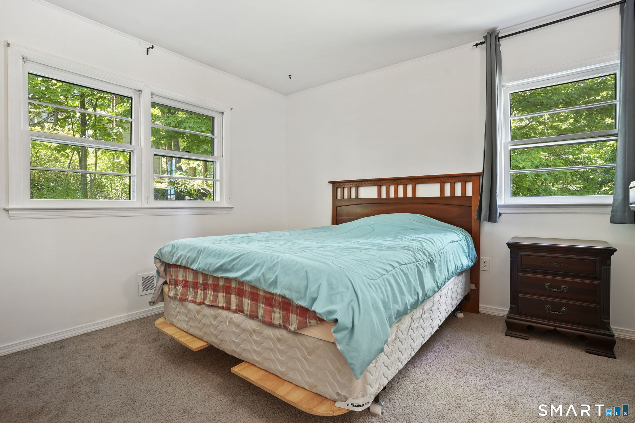2 Laurel Hill Road South Sherman, CT 06784 - Photo 16 of 35 a bed sitting in a bedroom next to a window