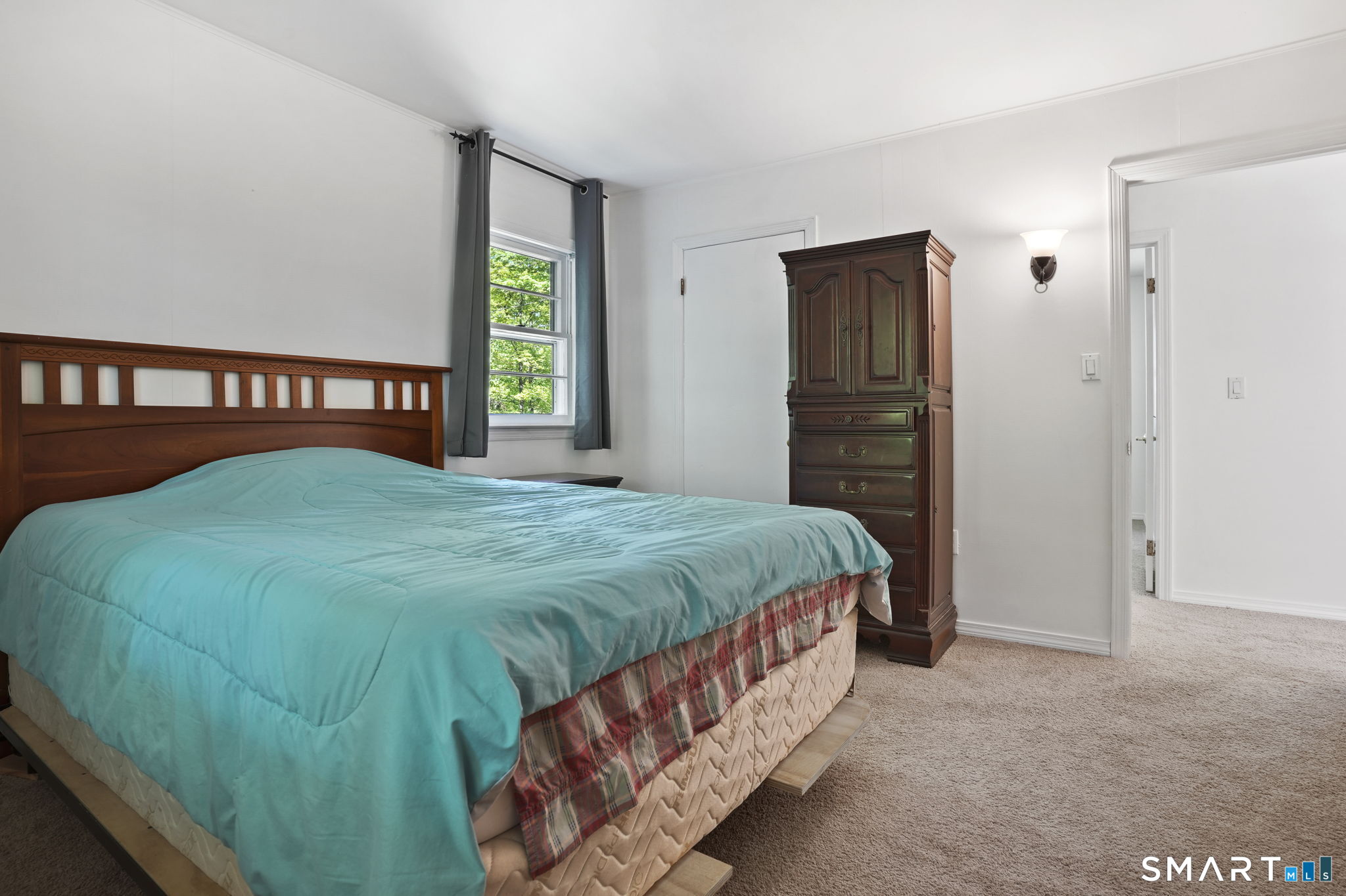 2 Laurel Hill Road South Sherman, CT 06784 - Photo 17 of 35 a bedroom with a bed and a window