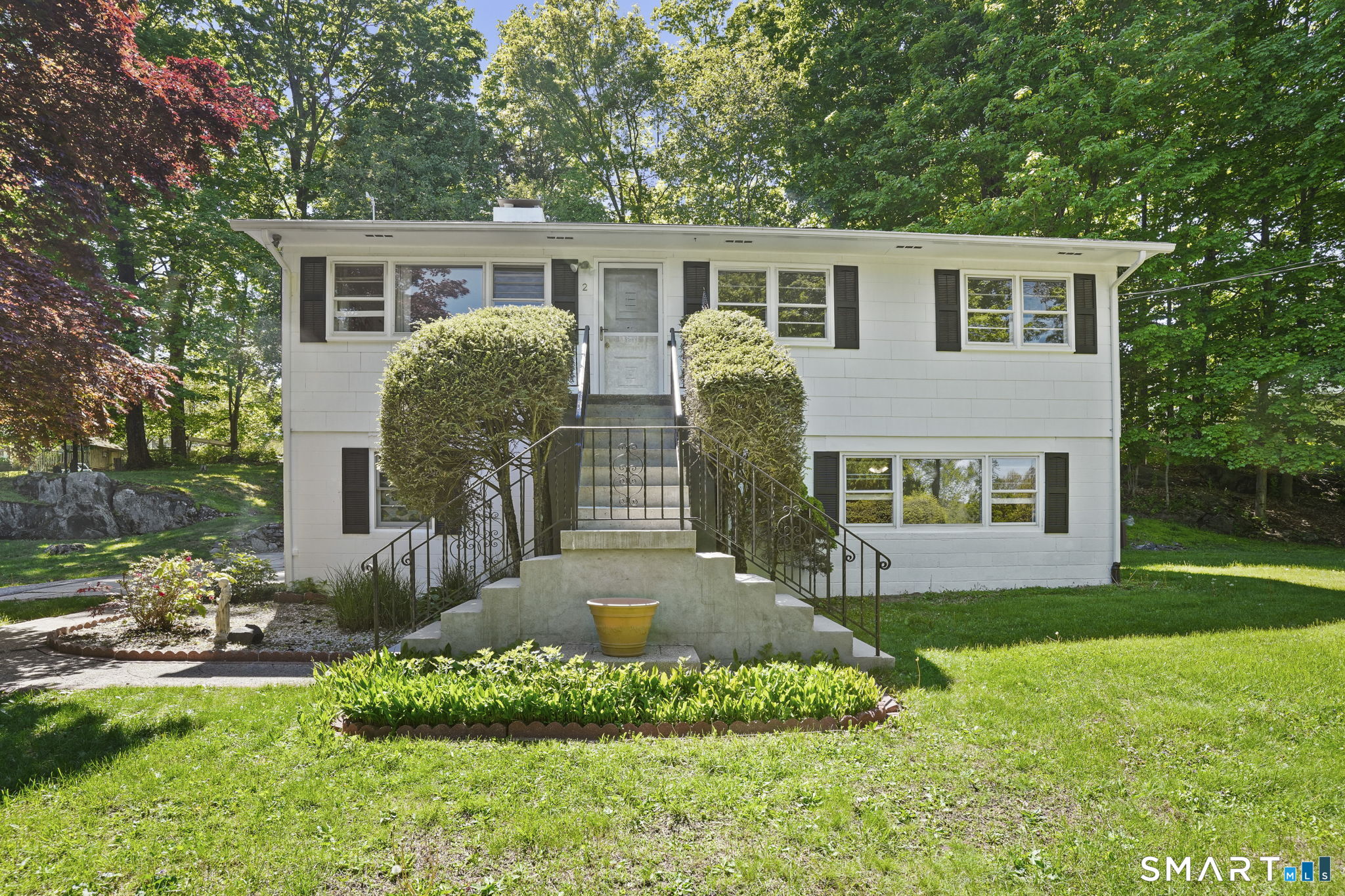 2 Laurel Hill Road South Sherman, CT 06784 - Photo 2 of 35 a front view of house with yard and green space