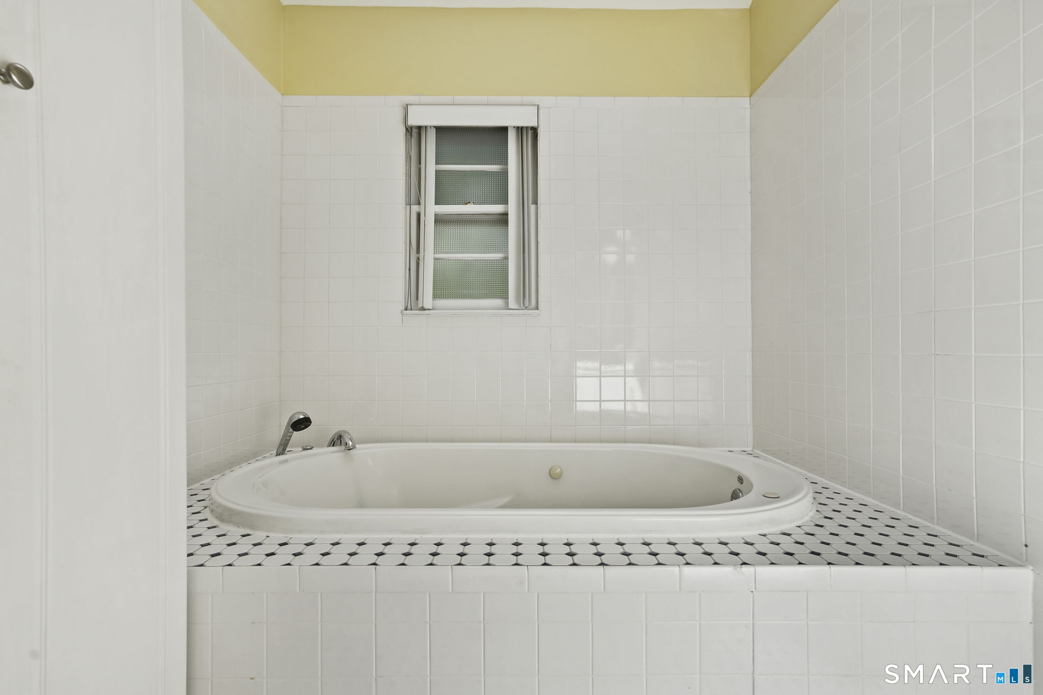 2 Laurel Hill Road South Sherman, CT 06784 - Photo 21 of 35 a bathroom with a tub and sink