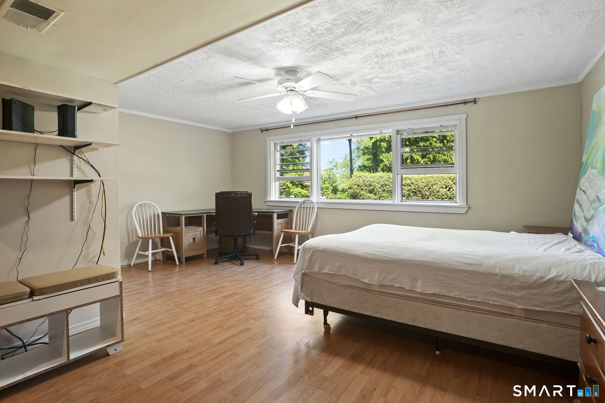 2 Laurel Hill Road South Sherman, CT 06784 - Photo 23 of 35 a bed room with a bed and a chair