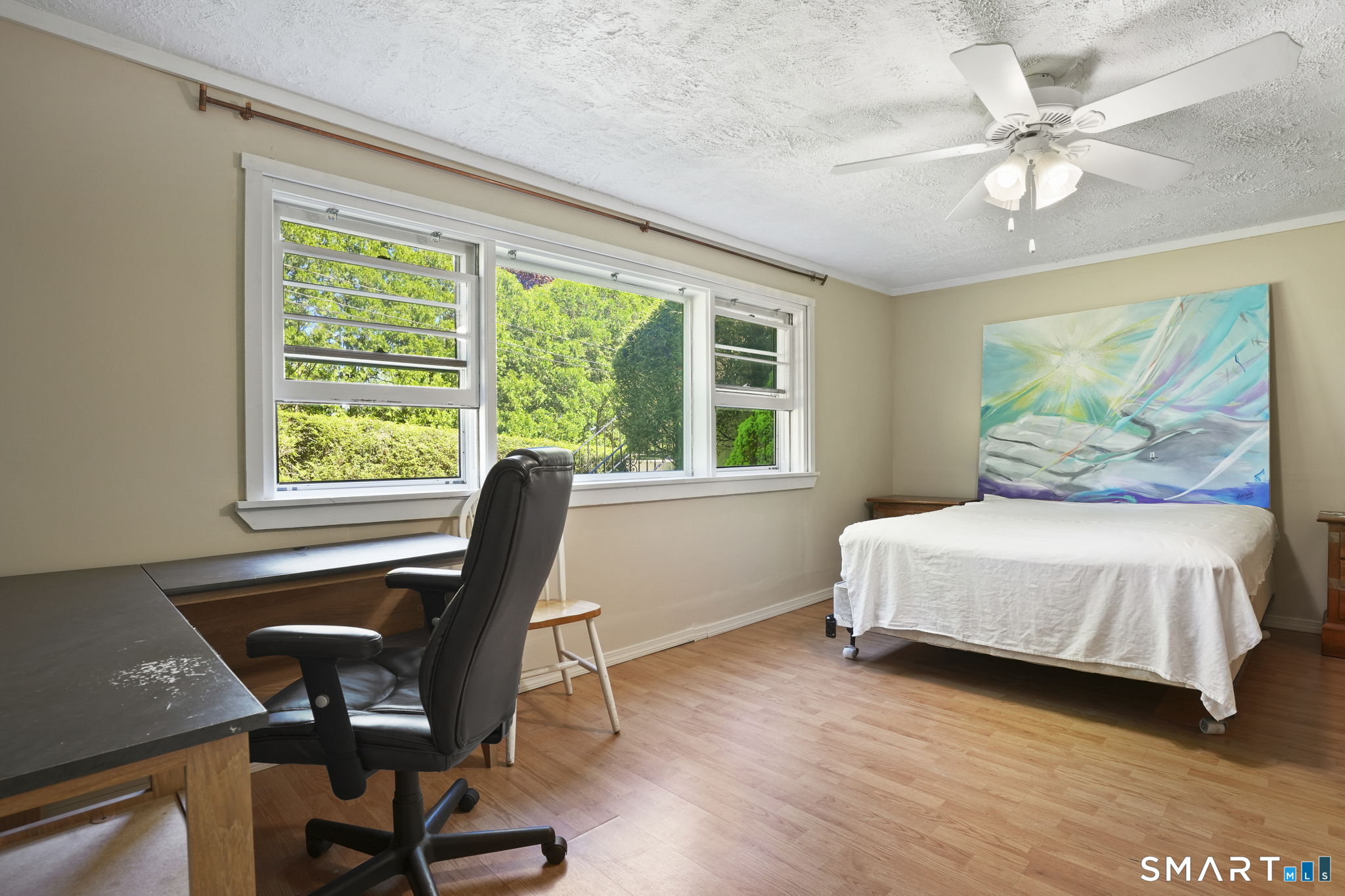 2 Laurel Hill Road South Sherman, CT 06784 - Photo 24 of 35 a bedroom with a bed and a large window