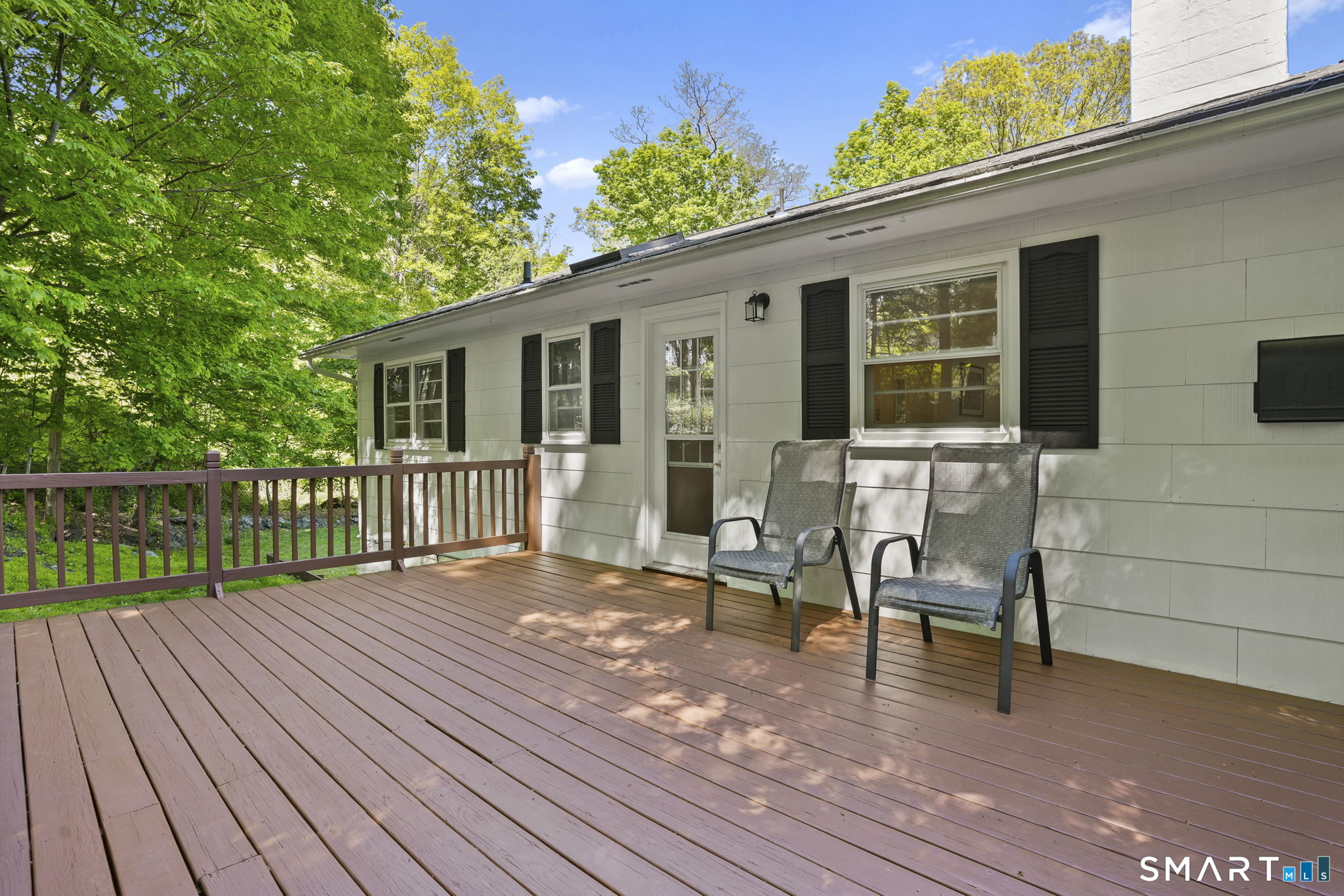 2 Laurel Hill Road South Sherman, CT 06784 - Photo 28 of 35 a view of a house with backyard and sitting area