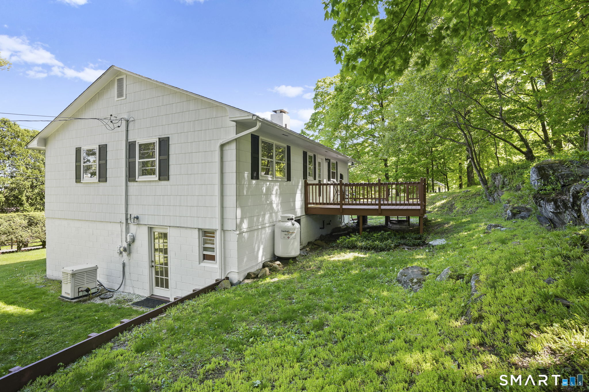 2 Laurel Hill Road South Sherman, CT 06784 - Photo 30 of 35 a front view of house with yard and green space