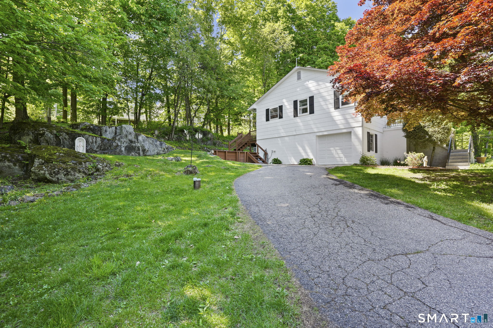 2 Laurel Hill Road South Sherman, CT 06784 - Photo 33 of 35 a front view of a house with garden