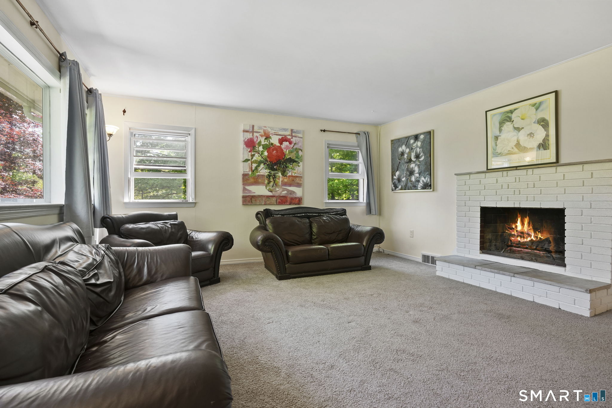 2 Laurel Hill Road South Sherman, CT 06784 - Photo 6 of 35 a living room with furniture and a fireplace