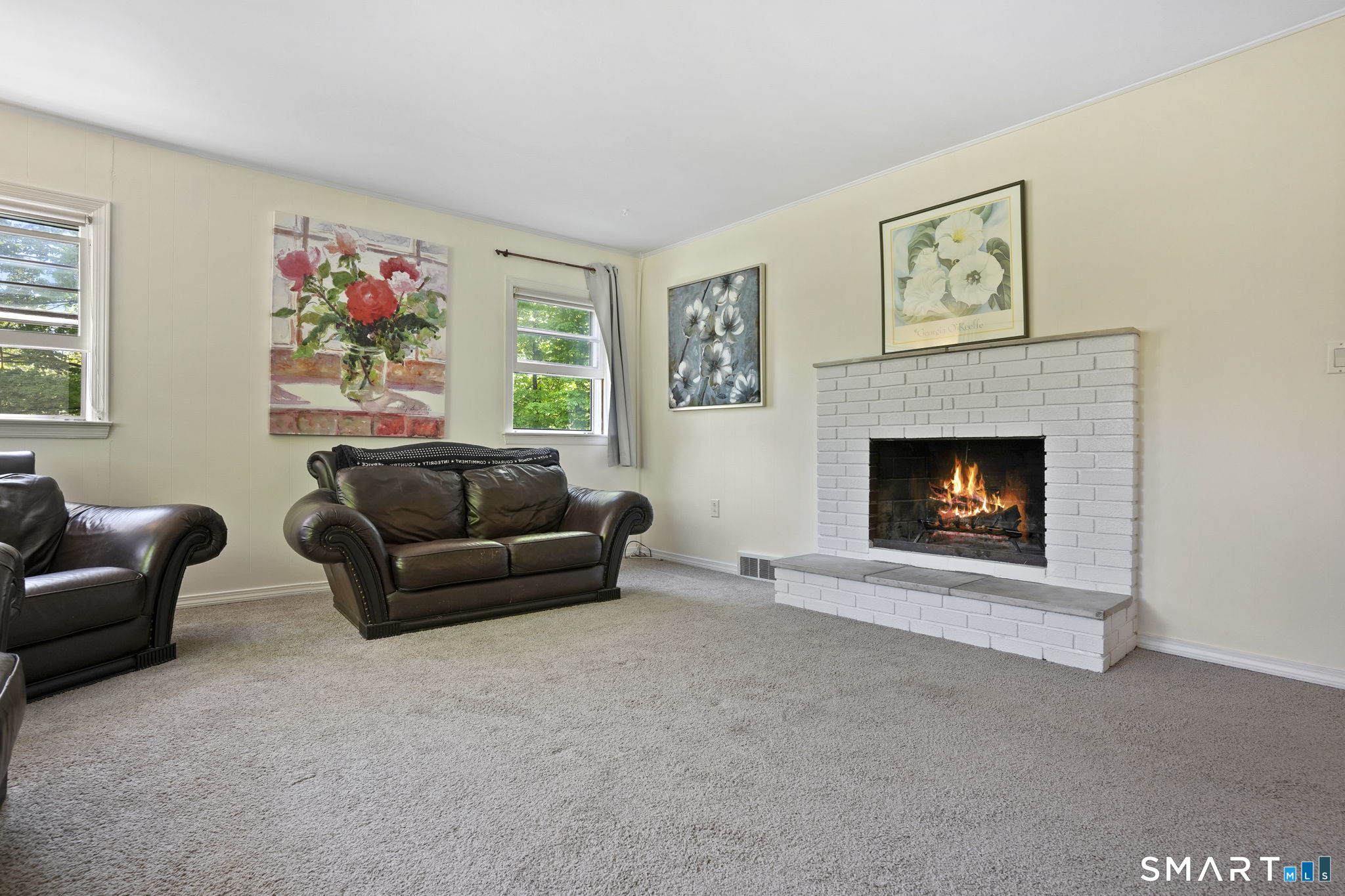 2 Laurel Hill Road South Sherman, CT 06784 - Photo 9 of 35 a living room with furniture and a fireplace