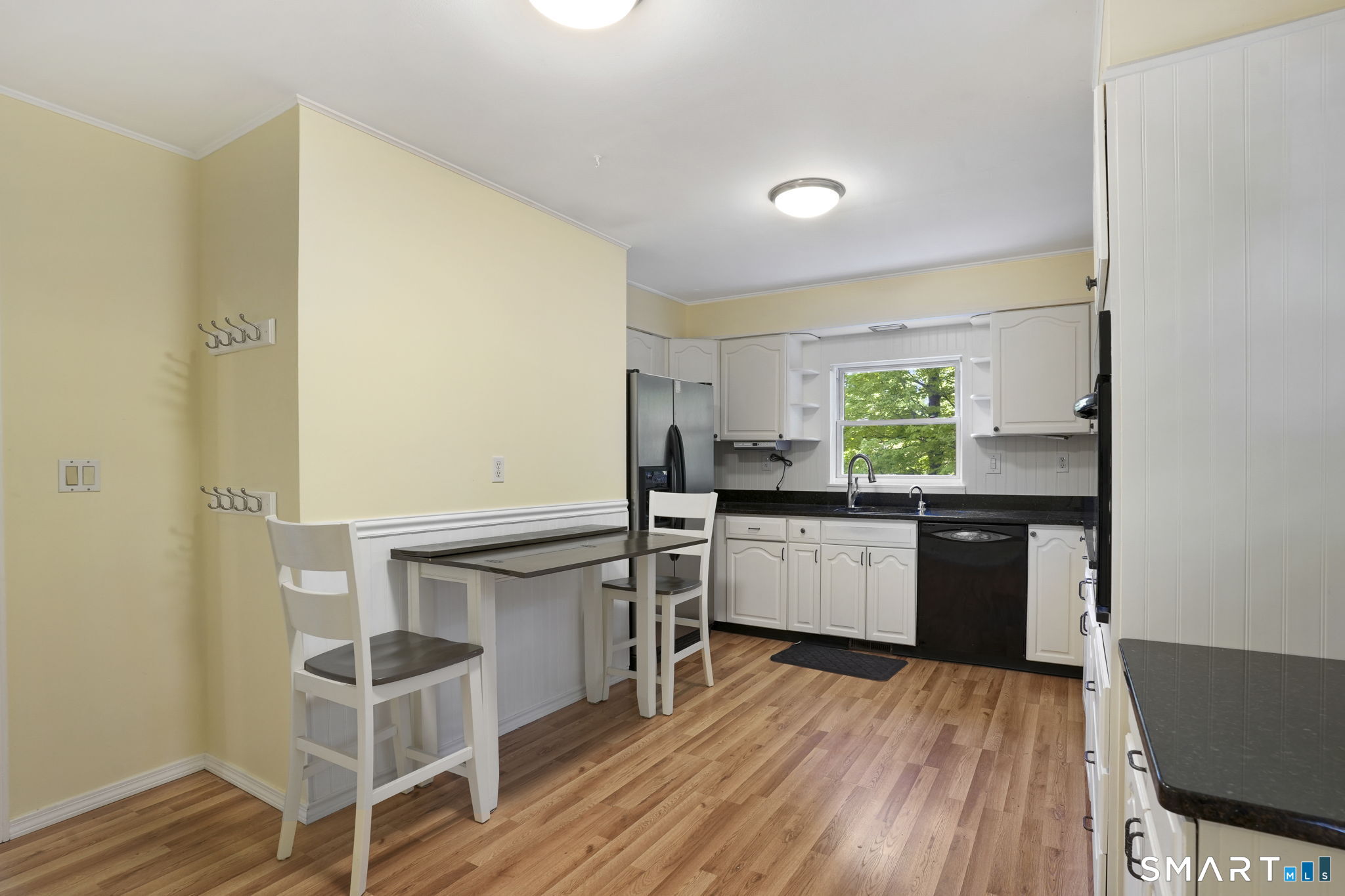 2 Laurel Hill Road South Sherman, CT 06784 - Photo 10 of 35 a kitchen with a sink cabinets and wooden floor
