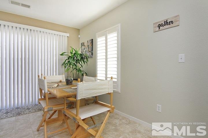 7724 Tulear Street Reno, NV 89506 - Photo 6 of 23 a dining room with furniture and window