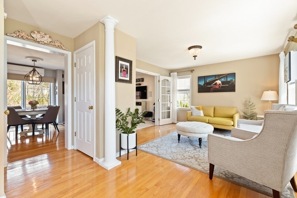82 Hammersmith Drive Saugus, MA 01906 - Photo 11 of 41 a living room with furniture and wooden floor