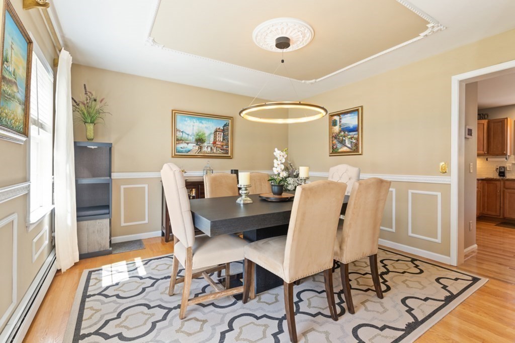 82 Hammersmith Drive Saugus, MA 01906 - Photo 15 of 41 a dining room with furniture and window