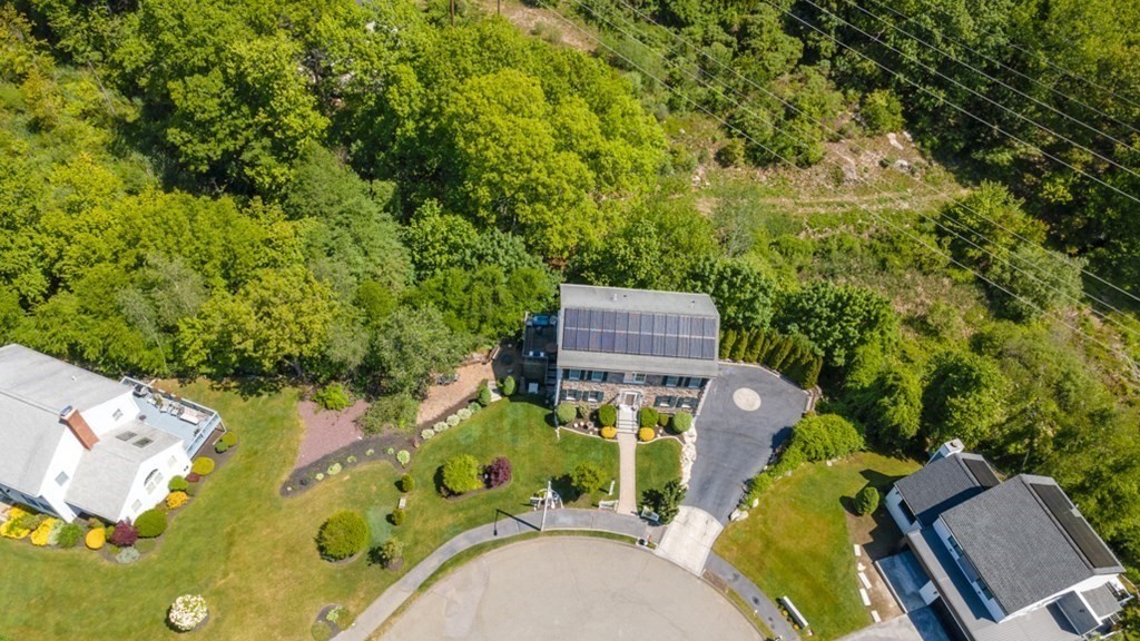 82 Hammersmith Drive Saugus, MA 01906 - Photo 33 of 41 an aerial view of a house with swimming pool and large trees