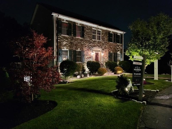 82 Hammersmith Drive Saugus, MA 01906 - Photo 41 of 41 a front view of a house with a yard garden and outdoor seating