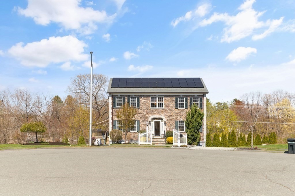 82 Hammersmith Drive Saugus, MA 01906 - Photo 6 of 41 a view of a building with a street