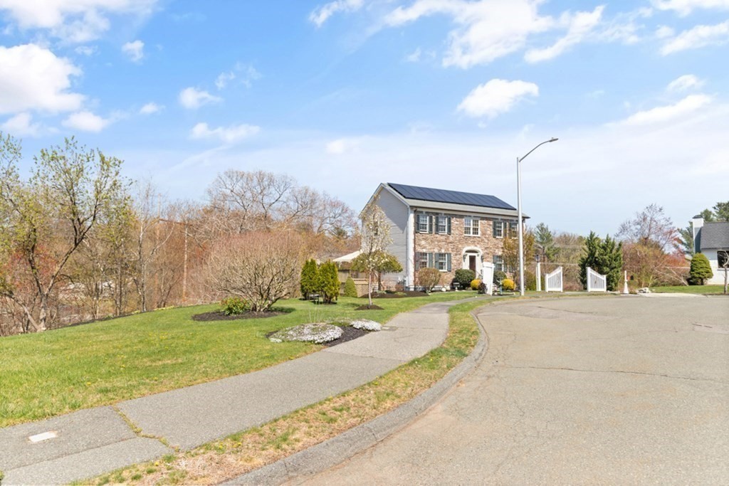 82 Hammersmith Drive Saugus, MA 01906 - Photo 7 of 41 a view of a city with tall buildings in the background