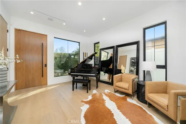 a living room with furniture and a gate