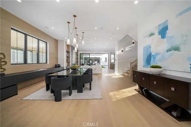 a view of a living room and dining room