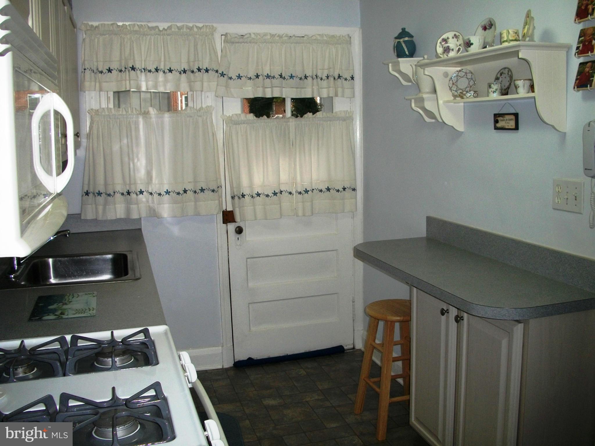 8662 Black Oak Road Baltimore, MD 21234 - Photo 11 of 30 a bathroom with a sink a toilet and shower