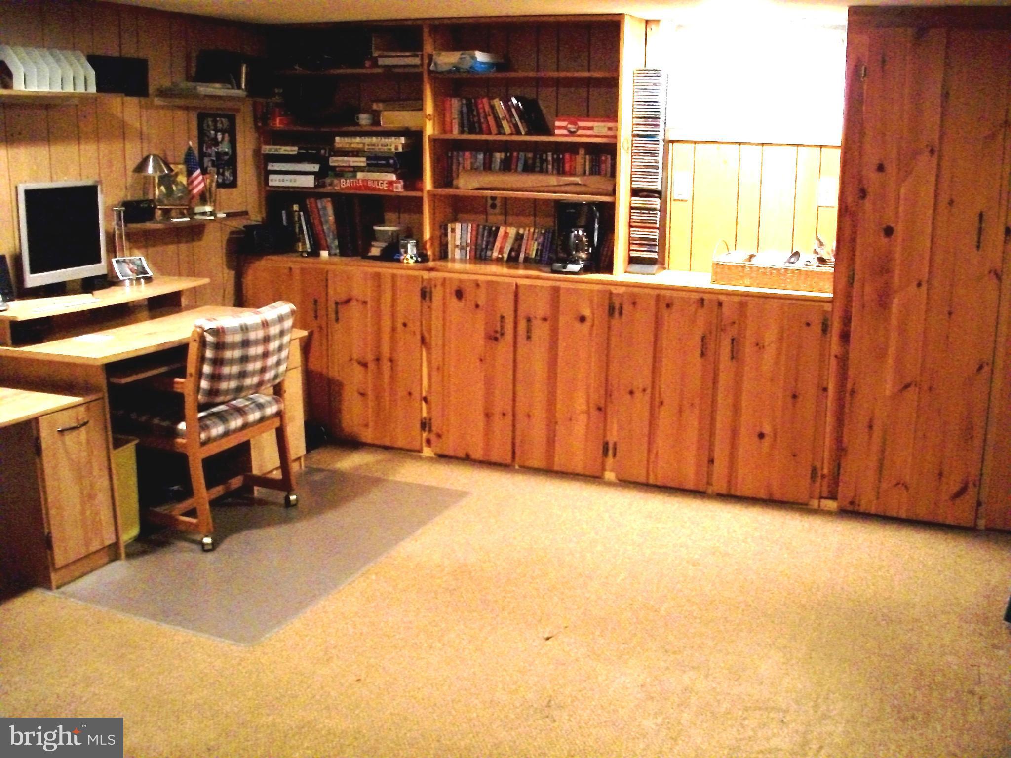 8662 Black Oak Road Baltimore, MD 21234 - Photo 18 of 30 a view of an empty room with shelves