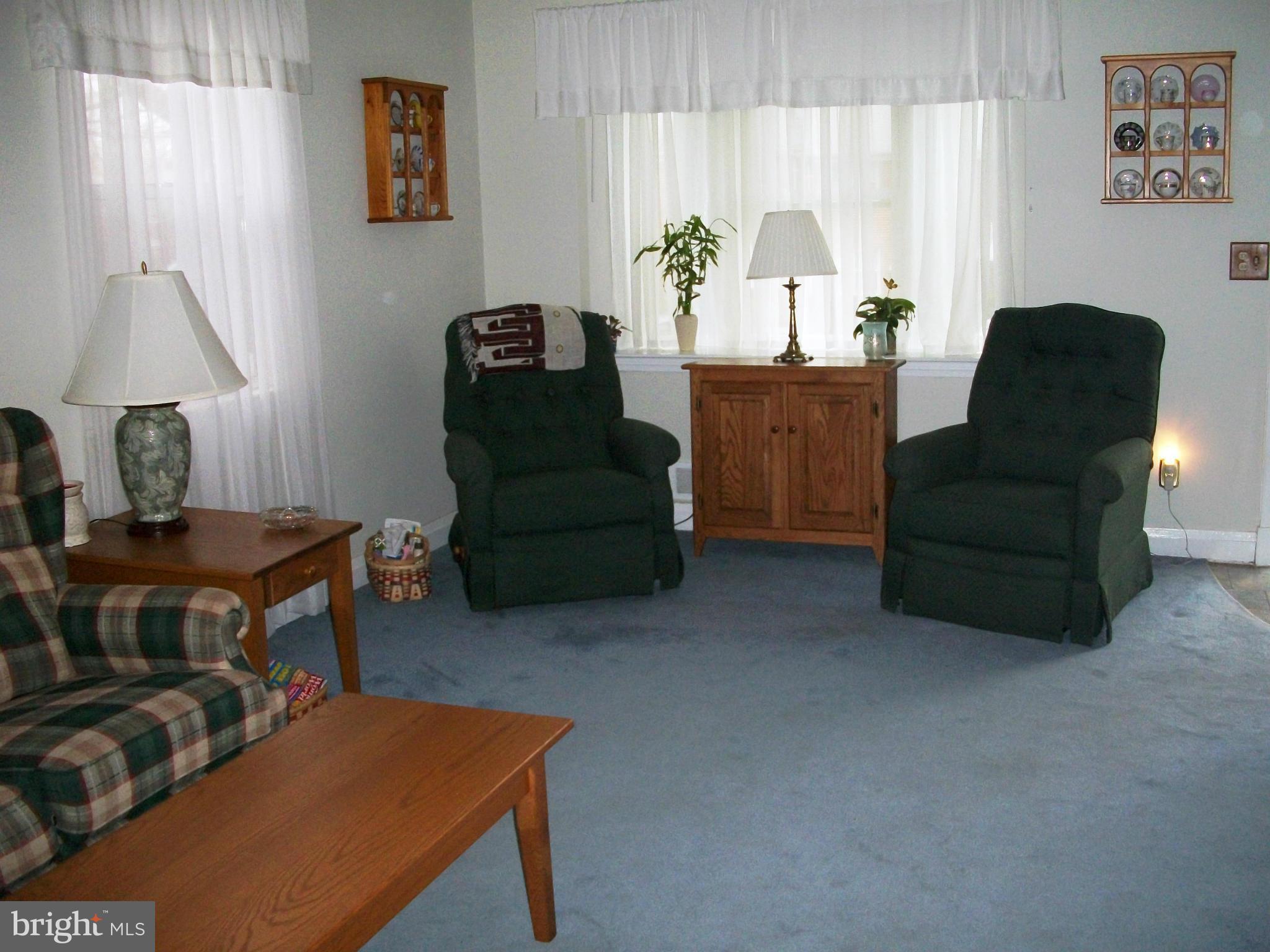 8662 Black Oak Road Baltimore, MD 21234 - Photo 7 of 30 a living room with furniture and a window