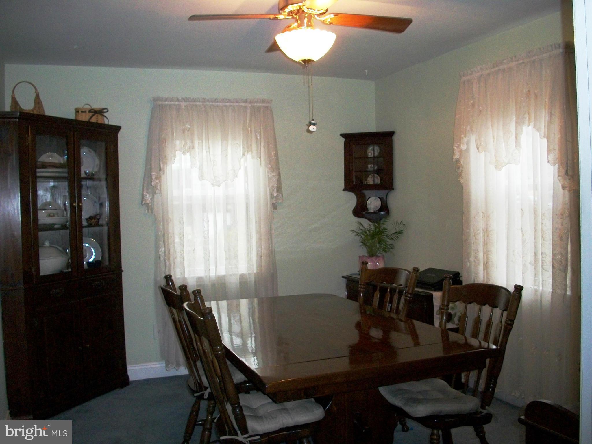 8662 Black Oak Road Baltimore, MD 21234 - Photo 8 of 30 a dining room with furniture and window