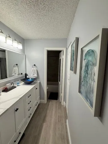 a view of kitchen with wooden floor