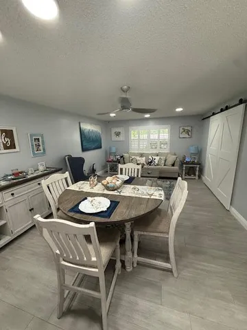 a view of a dining room with furniture