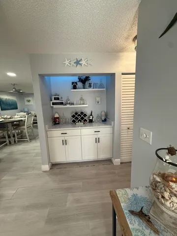 a bedroom with a bed and a desk