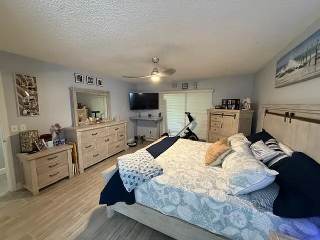 a spacious bathroom with a double vanity sink and a mirror