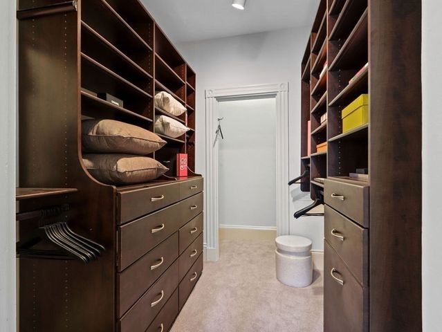 a room with a cabinets and a wooden floor