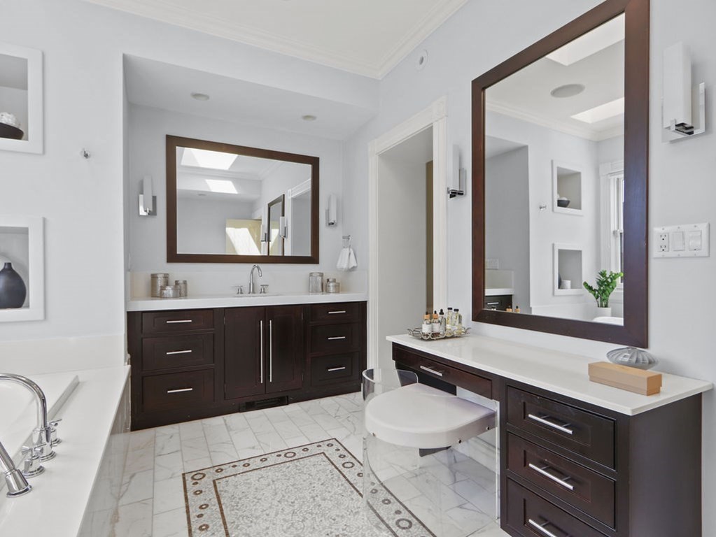 138 St Botolph Street Boston, MA 02115 - Photo 16 of 39 a bathroom with a sink vanity and a mirror
