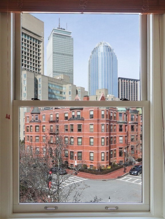 138 St Botolph Street Boston, MA 02115 - Photo 26 of 39 a bathroom with a sink and a mirror