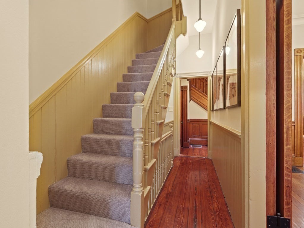 138 St Botolph Street Boston, MA 02115 - Photo 29 of 39 a view of entryway and hall with wooden floor