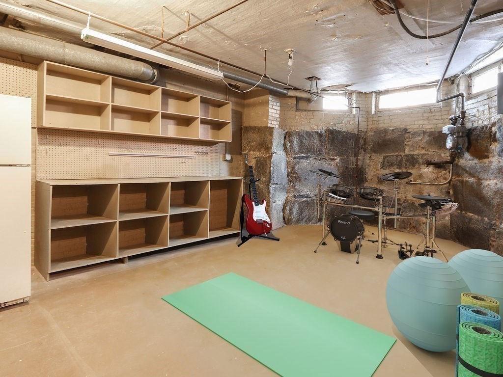 138 St Botolph Street Boston, MA 02115 - Photo 34 of 39 a view of a room with gym equipment