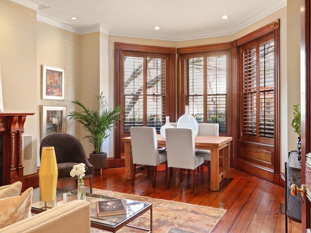 138 St Botolph Street Boston, MA 02115 - Photo 4 of 39 a dining room with furniture window and wooden floor