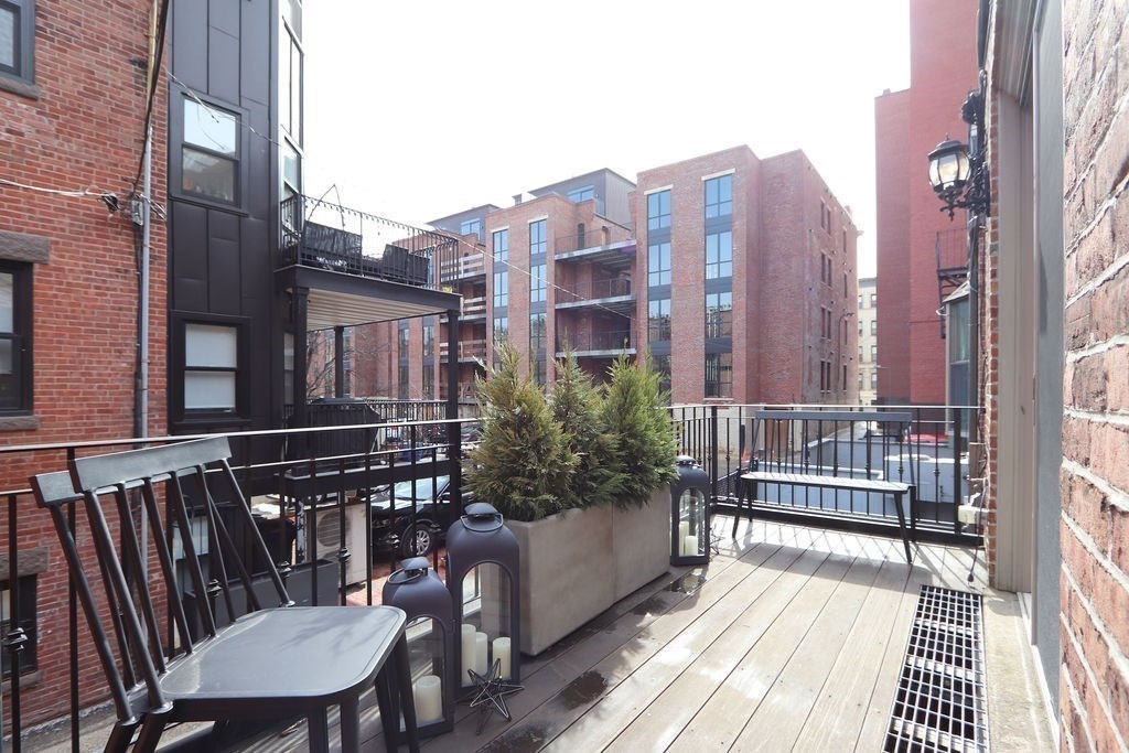 138 St Botolph Street Boston, MA 02115 - Photo 10 of 39 a view of a balcony with furniture