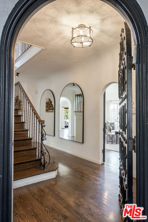 8420 Cresthill Road Los Angeles, CA 90069 - Photo 4 of 30 a view of entryway and hall with wooden floor