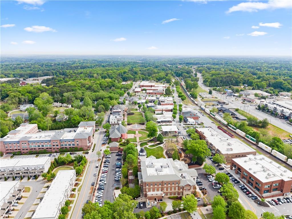 3206 Ridge Towne Place Duluth, GA 30096 - Photo 38 of 42 an aerial view of a city with lots of residential buildings